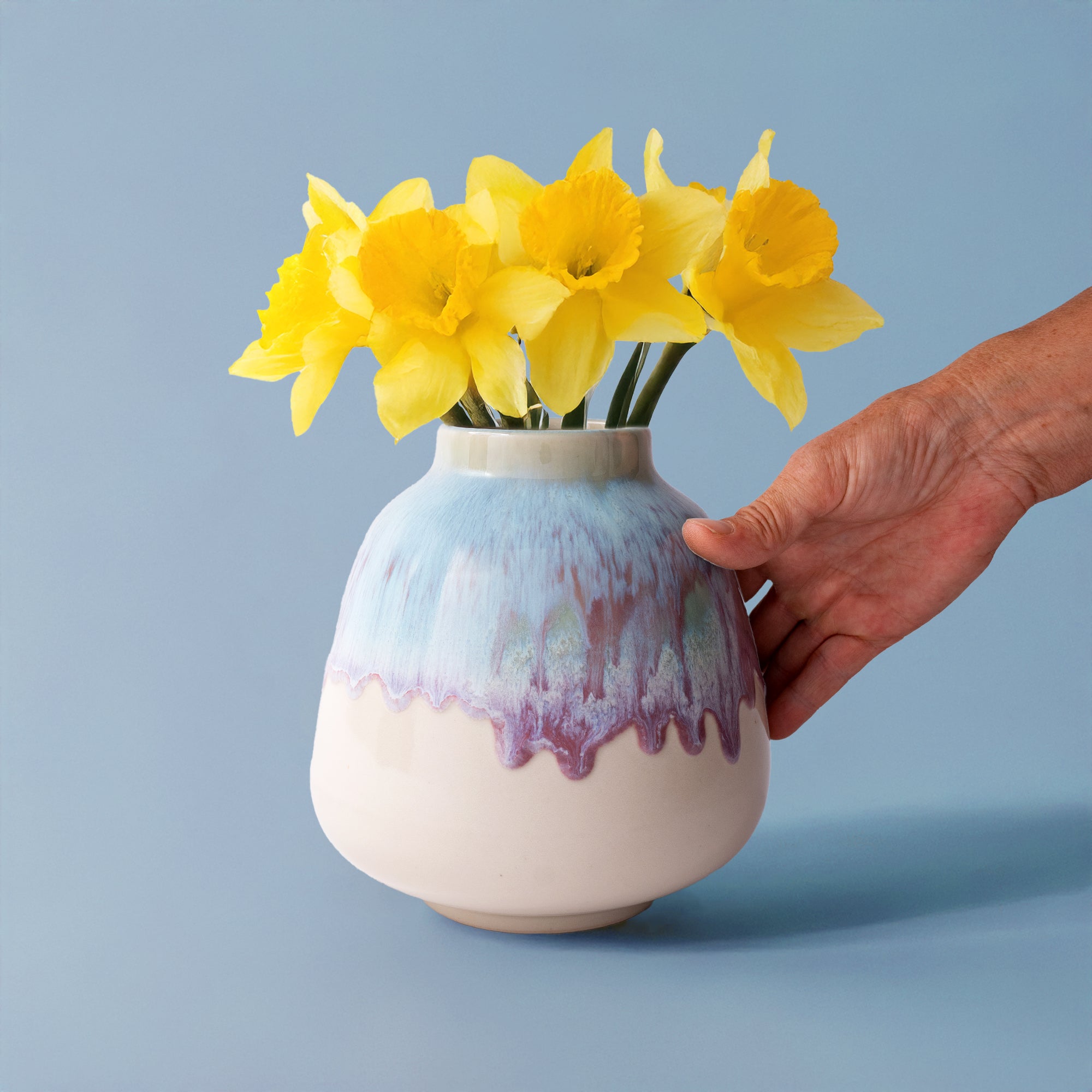 Pottery For The Planet ceramic bouquet vase for home decor with yellow daffodils and blue purple glaze