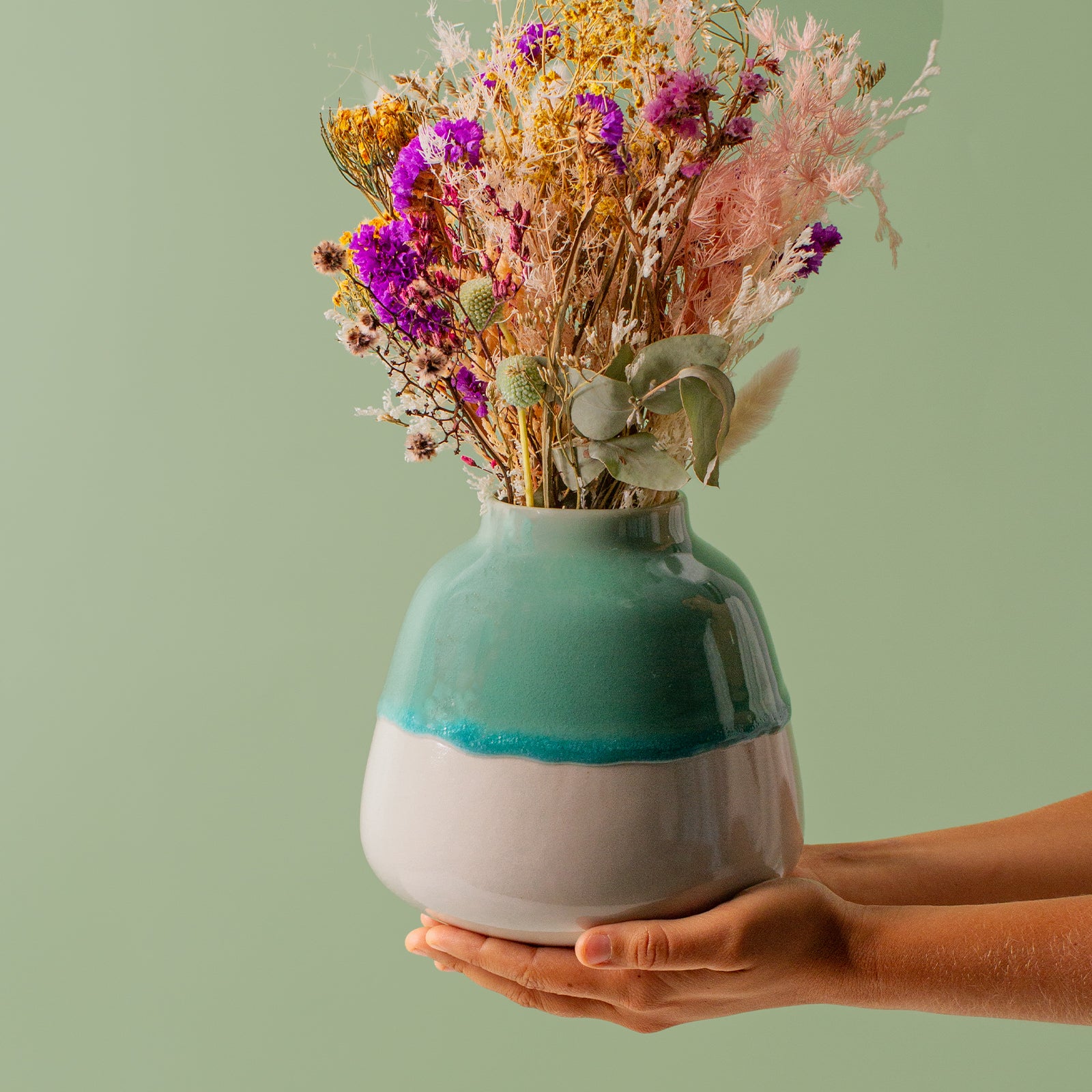 Pottery For The Planet bouquet vase for home decor in green and white ceramic with dried flowers