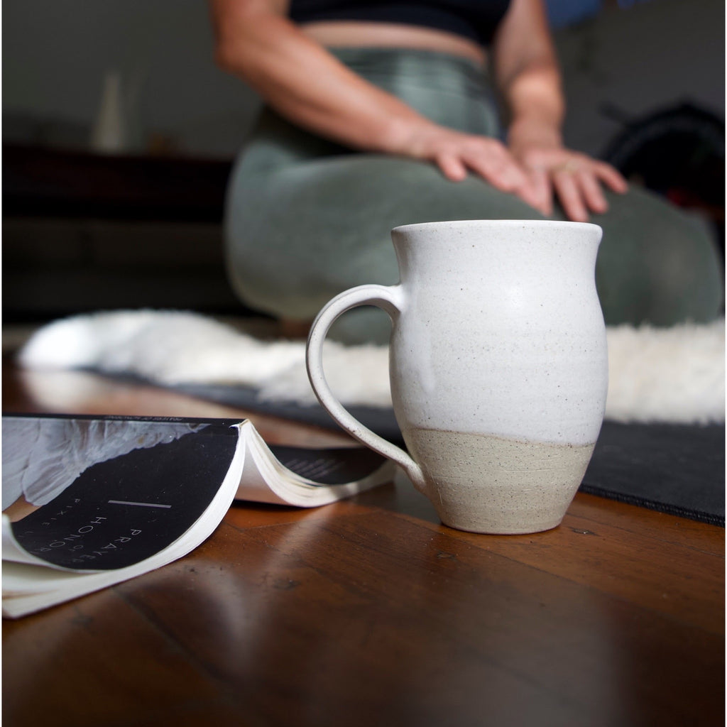 Sandy Mug, Book and Bec in Yoga Pose