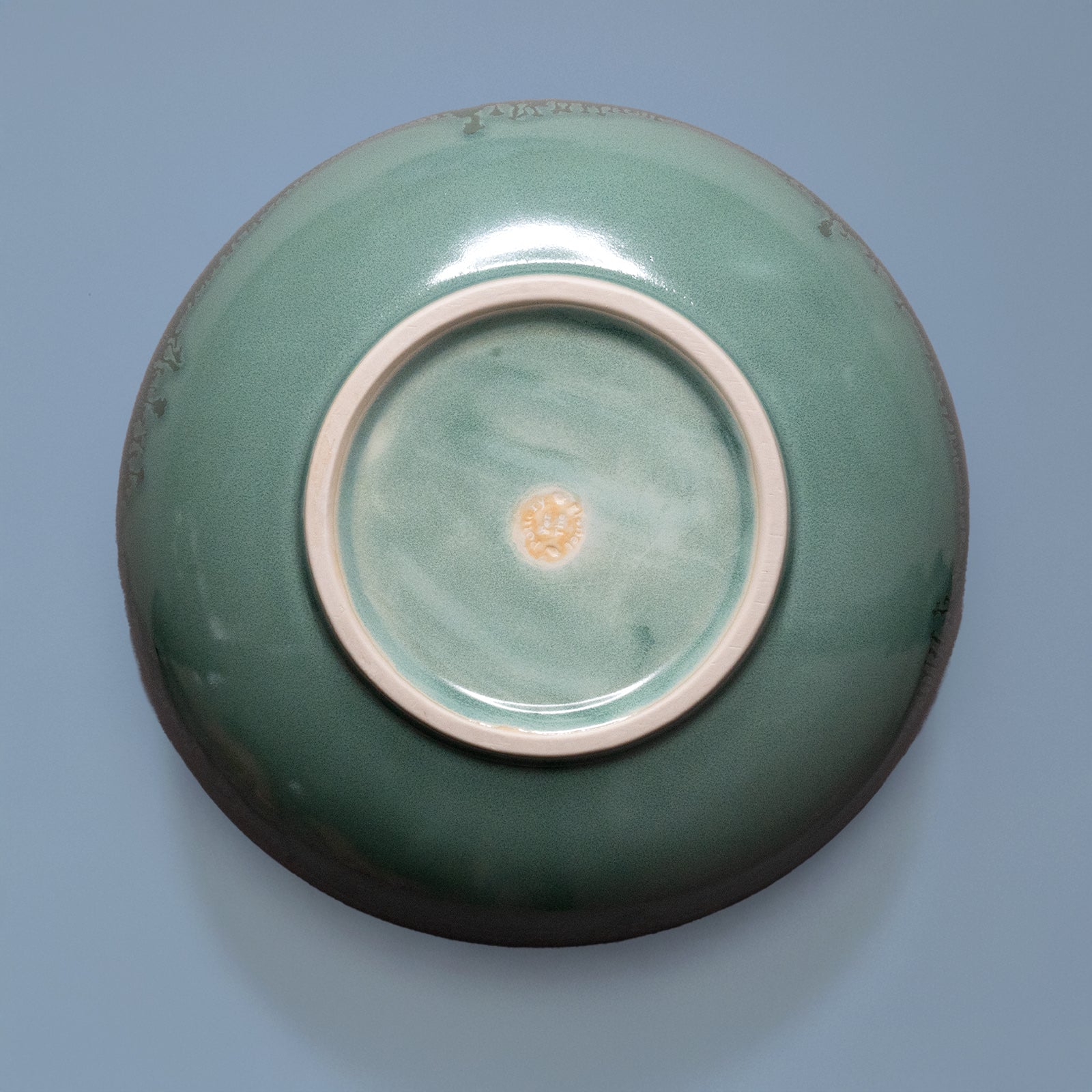 Potter For The Planet Salad Bowl Ocean Jasper in hand