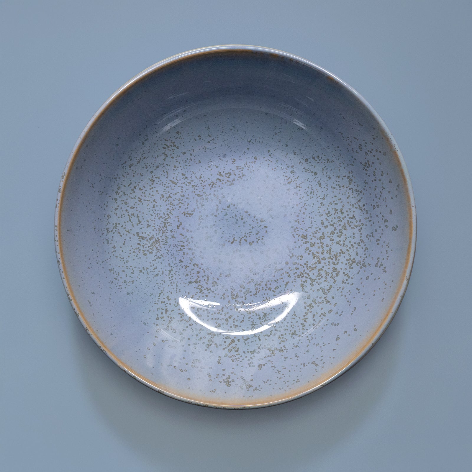 Potter For The Planet Salad Bowl Ocean Jasper in hand
