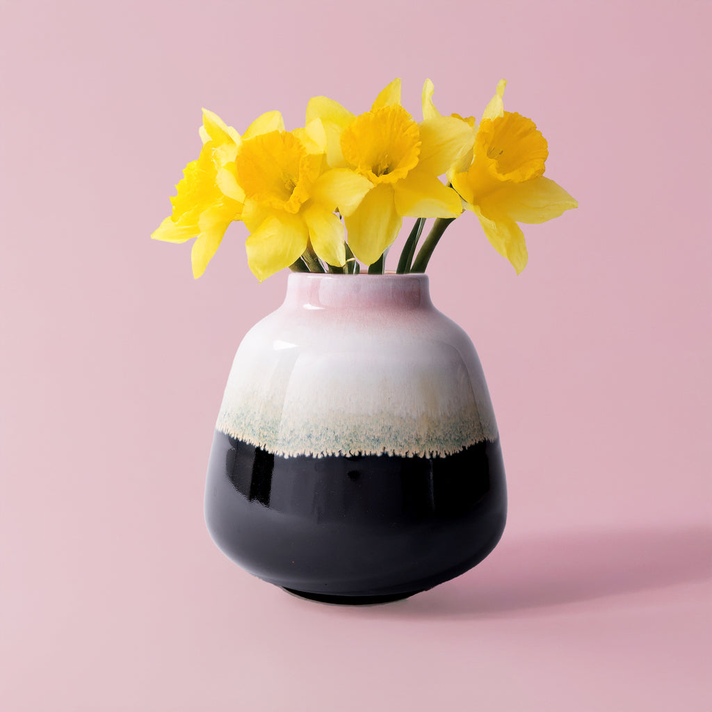 Pottery For The Planet ceramic bouquet vase for home decor with yellow daffodils on pink background