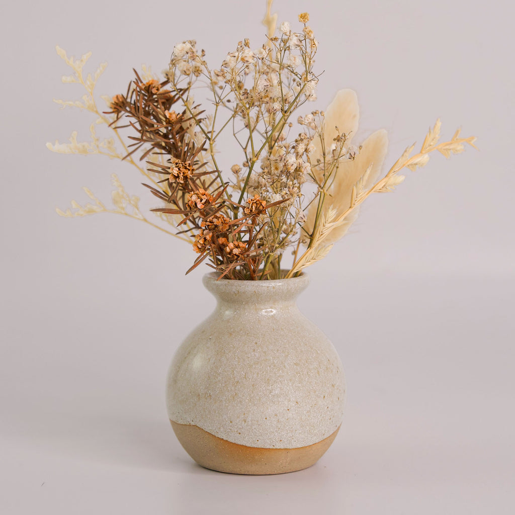 Pottery For The Planet eco-friendly home decor vase with dried floral arrangement in neutral tones