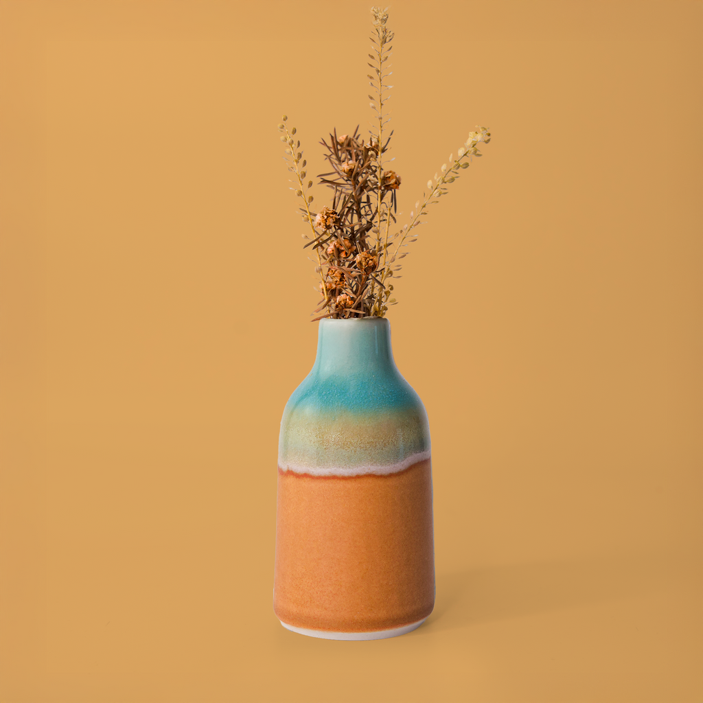 Pottery For The Planet modern decorative flower vase in blue and orange with dried flowers
