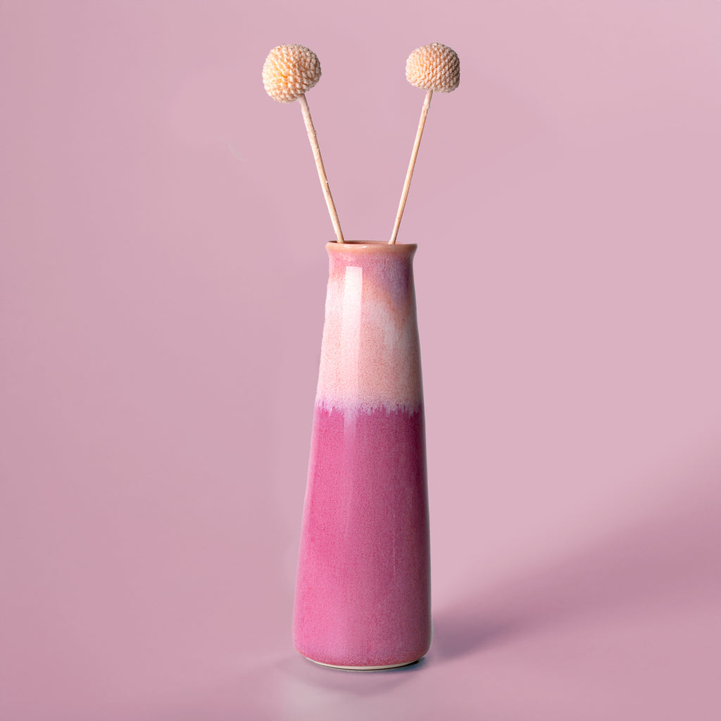 Pottery For The Planet pink gradient sustainable home decor vase with two dried flower stems