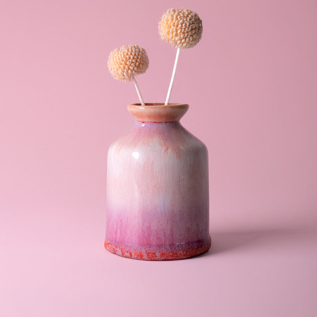 Pottery For The Planet pink ceramic miniature decorative vase for shelf with dried flowers on pink background