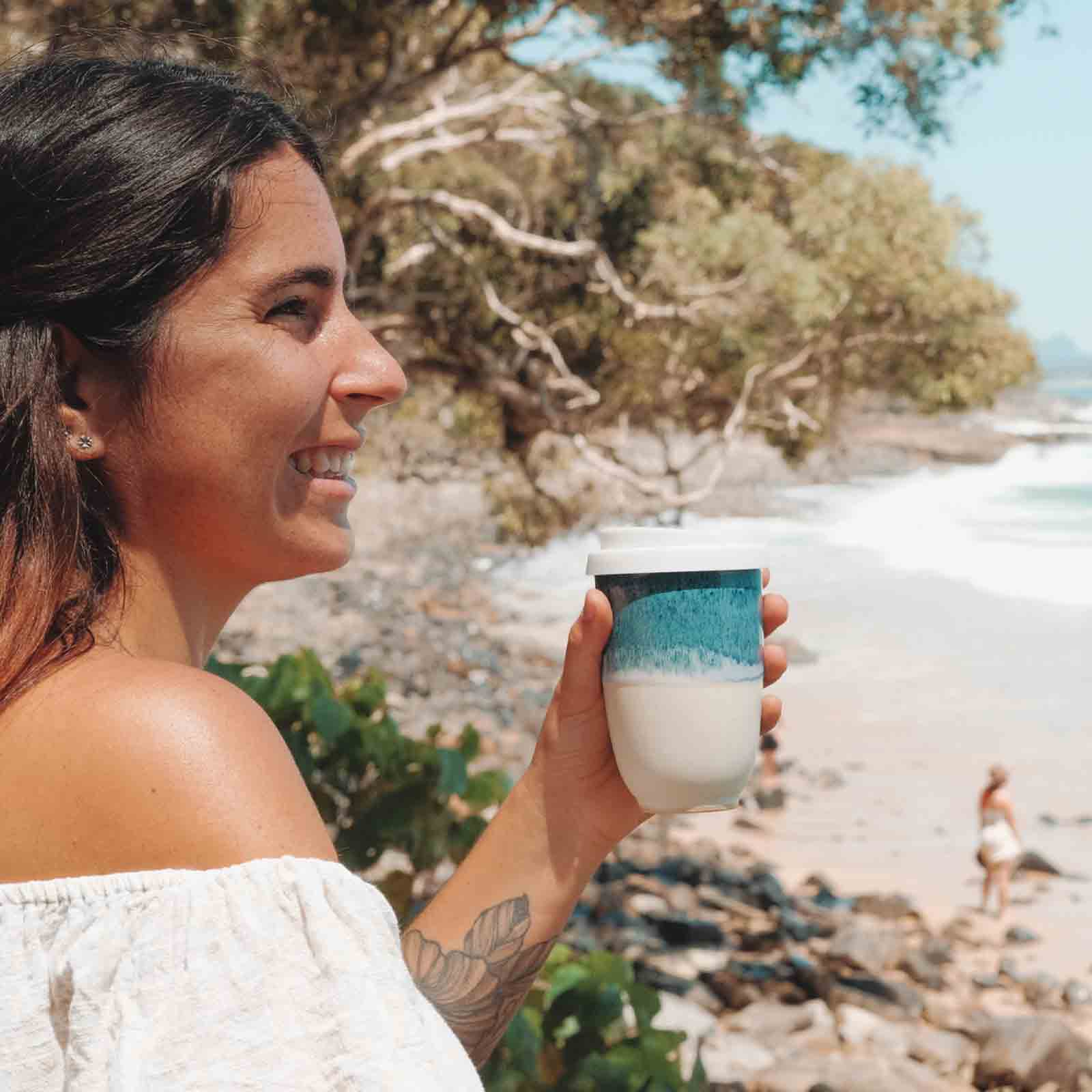 Ocean Keep Cup with girl on beach