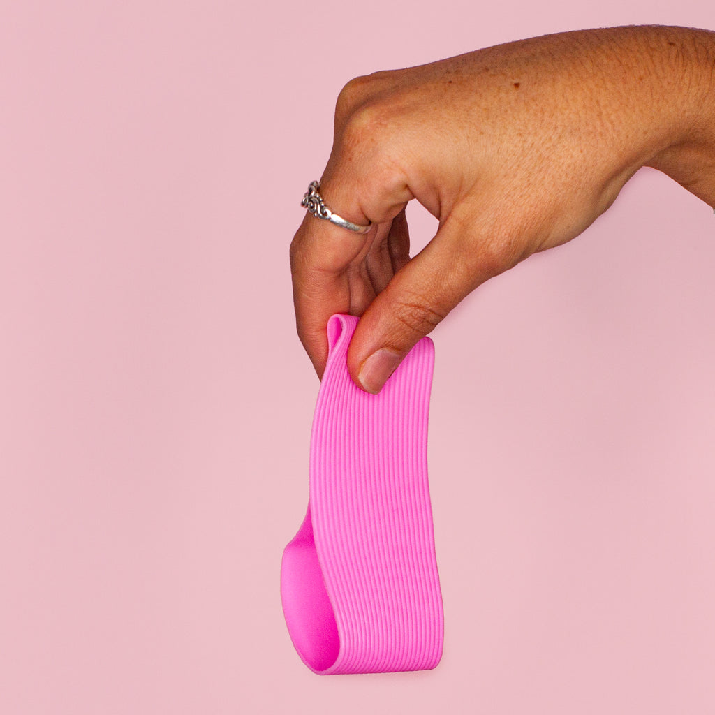 pink heatband in hand